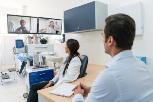 Doctors on a group telemedicine call for a patient consultation