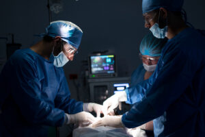 Surgeons performing emergency surgery