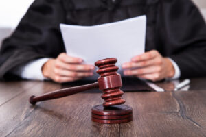 Judge looking at a document before making a decision