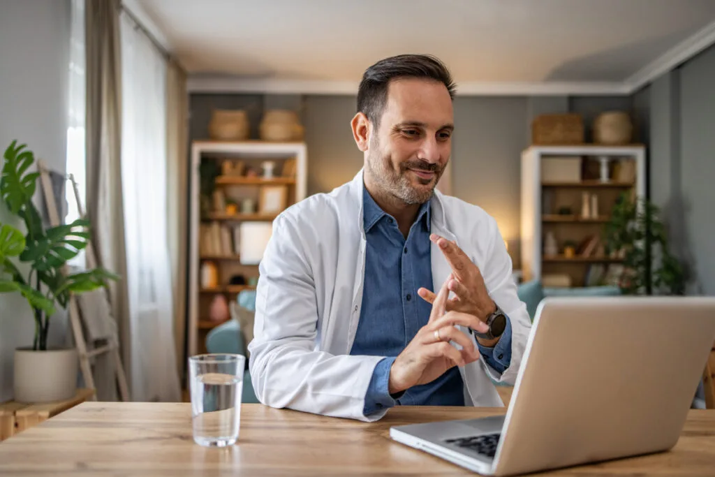 Male physician during a  virtual consultation with Medical Justice