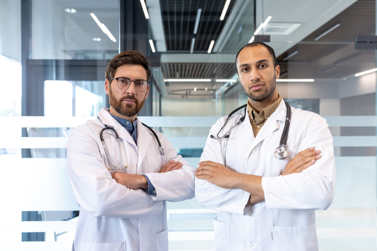 Two competing male physicians